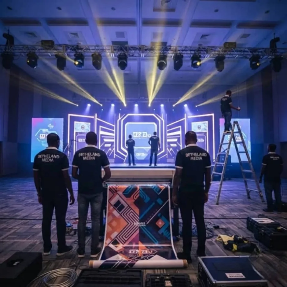 Bethadel crew preparing a stage set with intelligent lighting